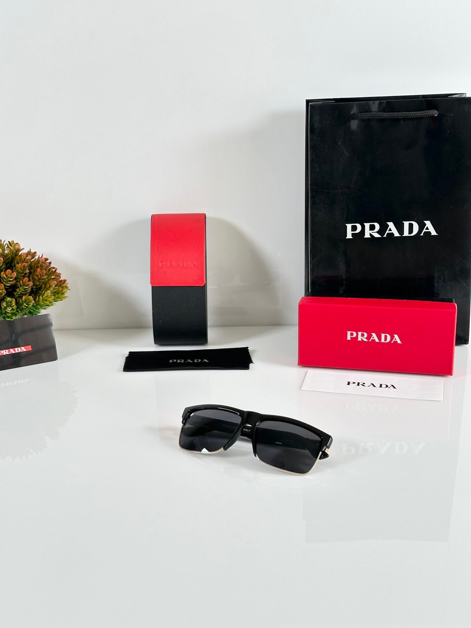 Prada_69_Gold_Black