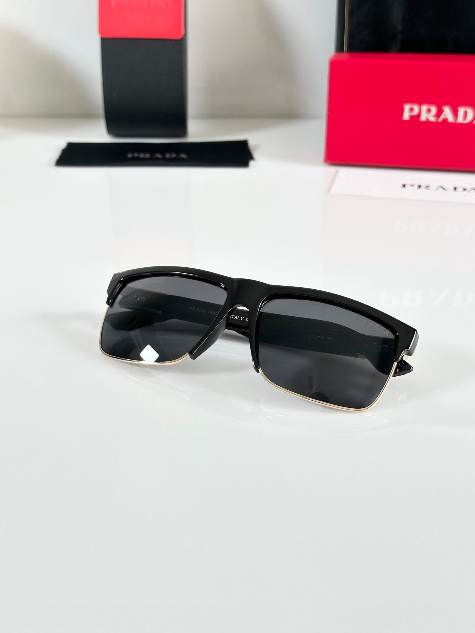 Prada_69_Gold_Black