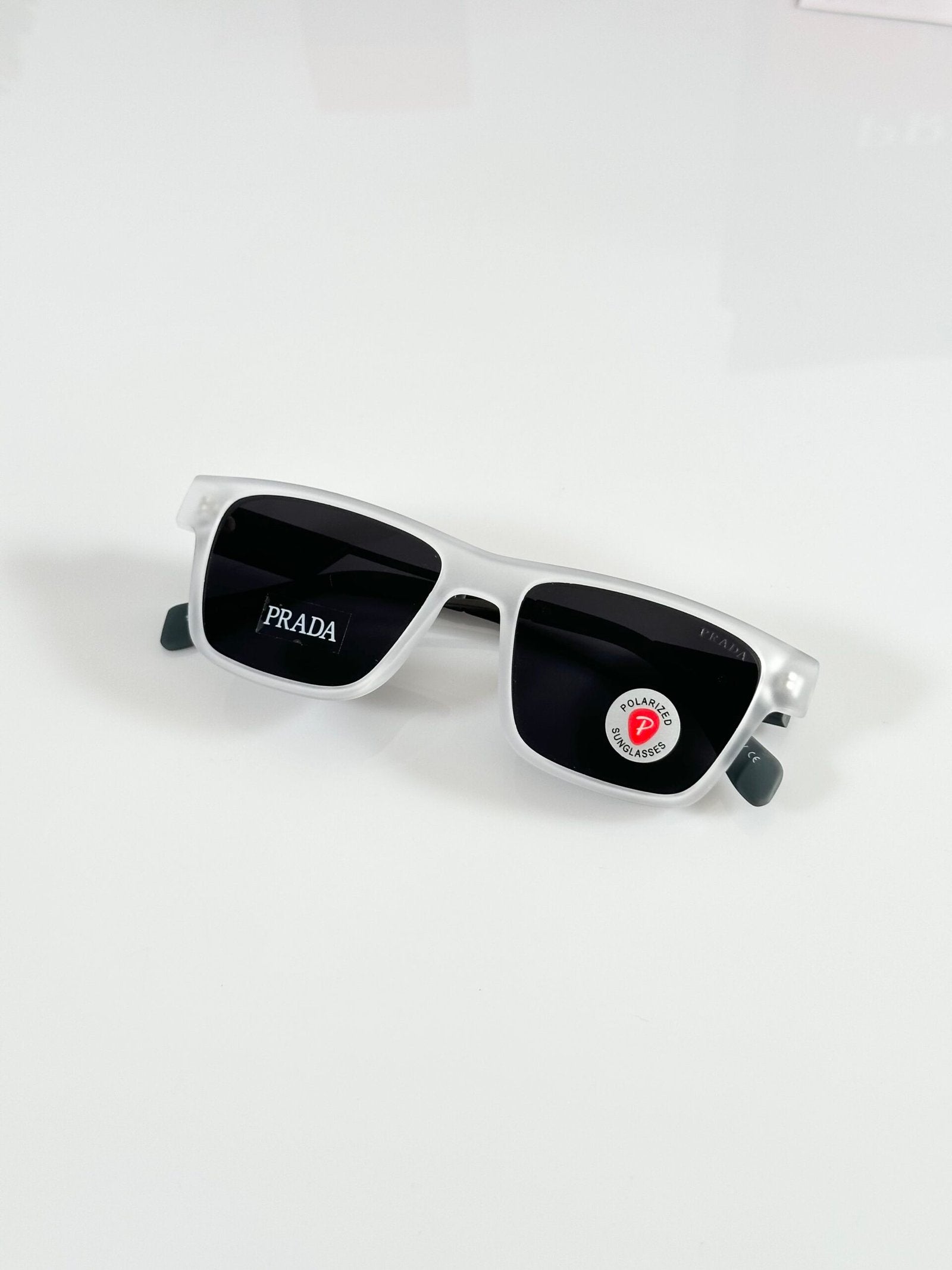 Prada_144_Ice_Black_Grey_Stick